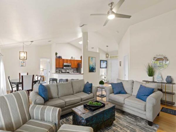 Canal Front Charming 4 Bedroom Home with Screened Patio