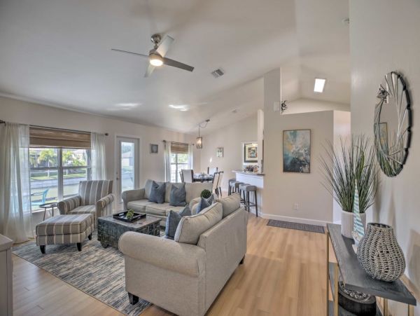 Canal Front Charming 4 Bedroom Home with Screened Patio