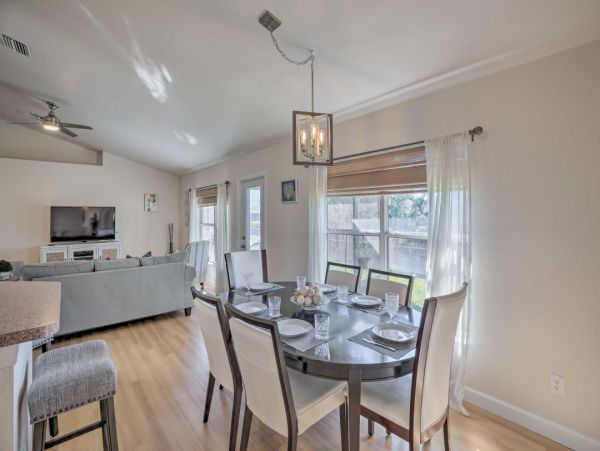 Canal Front Charming 4 Bedroom Home with Screened Patio