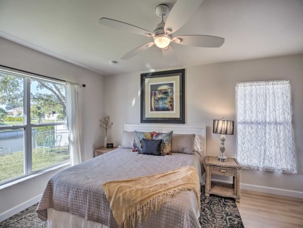 Canal Front Charming 4 Bedroom Home with Screened Patio
