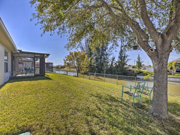 Canal Front Charming 4 Bedroom Home with Screened Patio