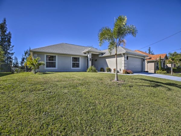 Canal Front Charming 4 Bedroom Home with Screened Patio
