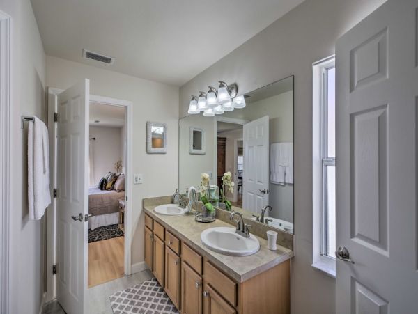 Canal Front Charming 4 Bedroom Home with Screened Patio