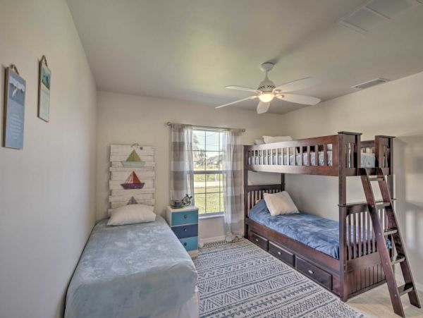 Canal Front Charming 4 Bedroom Home with Screened Patio