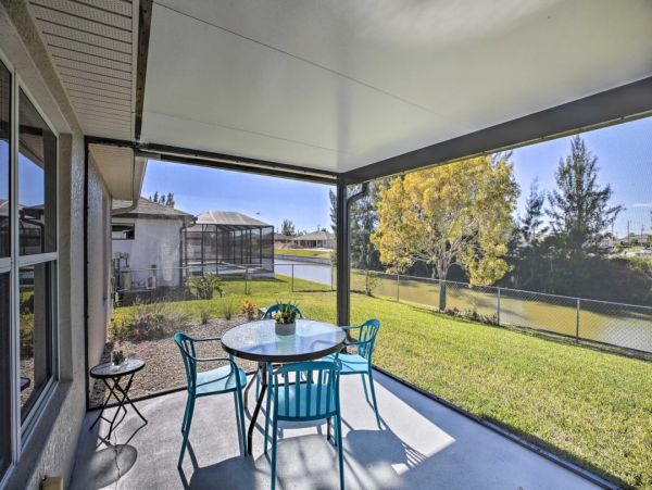 Canal Front Charming 4 Bedroom Home with Screened Patio