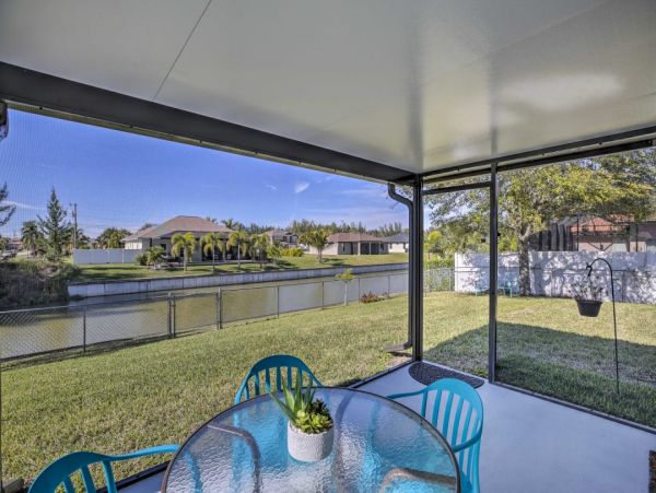 Canal Front Charming 4 Bedroom Home with Screened Patio