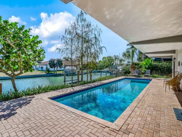 Marco Island Four Bedrooms Canal Front with Pool