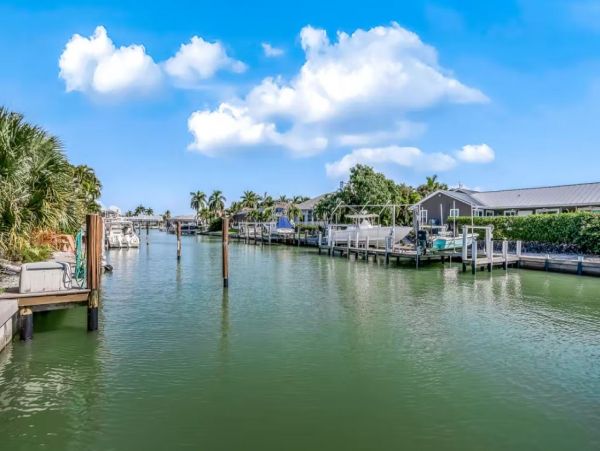 Marco Island Four Bedrooms Canal Front with Pool