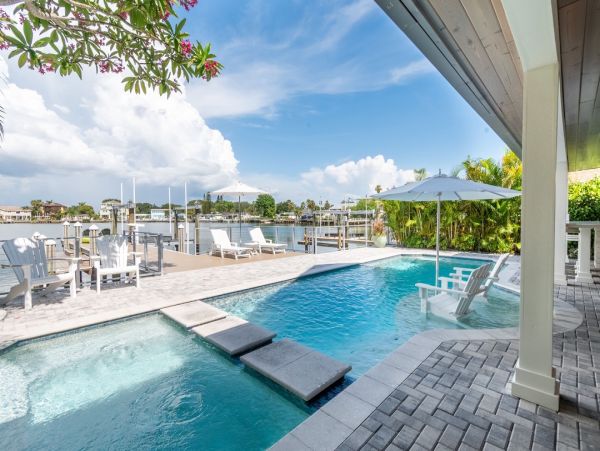 Luxury Indian Rocks Beach Vacation Rental Waterfront Home with Pool, Hot Tub & Dock