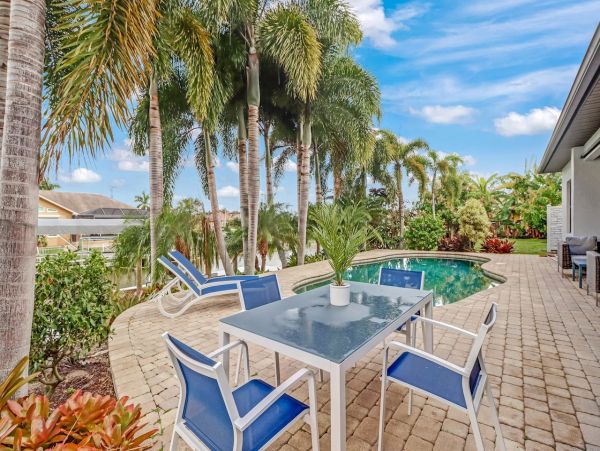 Canal-Front Vacation Home with Pool and Boat Dock