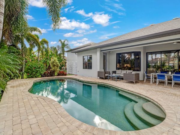 Canal-Front Vacation Home with Pool and Boat Dock