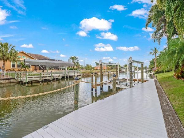 Canal-Front Vacation Home with Pool and Boat Dock