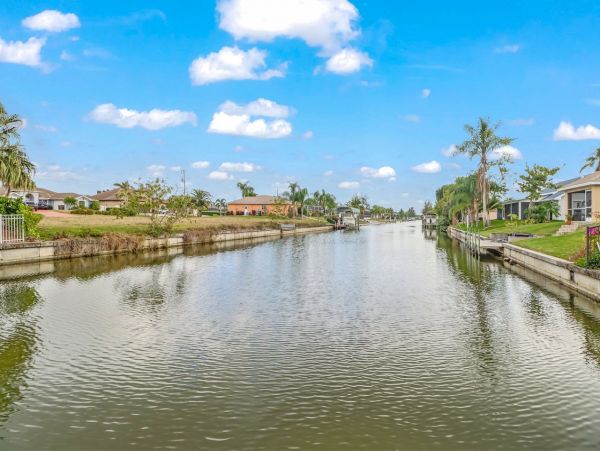 Canal-Front Vacation Home with Pool and Boat Dock