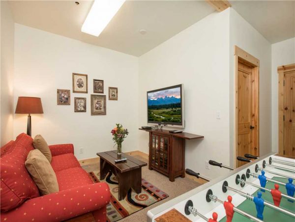 Family Room w/ TV & Foosball--Lower Floor