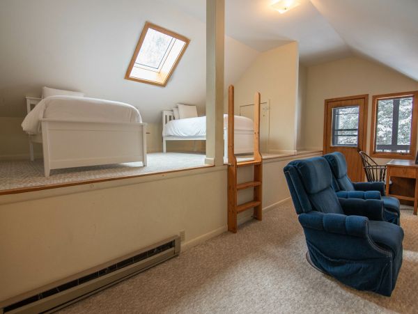 Loft with 2 Twin Beds, seating area and balcony deck--Upper Level