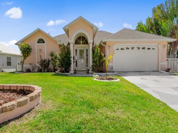 Cape Coral 3 Bedroom Home with Canal Views & Pool Sleeps 6