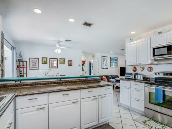 Bonita Springs Vacation Rental with Caged Pool Sleeps Six