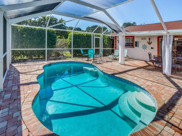Bonita Springs Vacation Rental with Caged Pool Sleeps Six