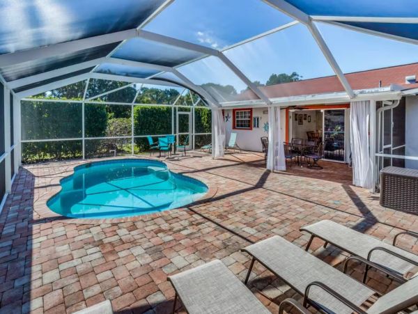 Bonita Springs Vacation Rental with Caged Pool Sleeps Six