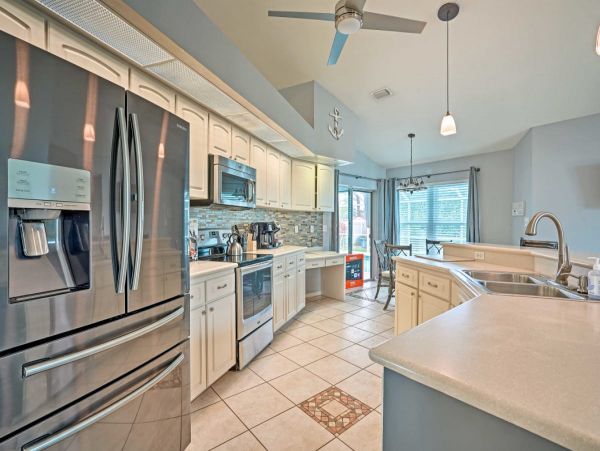 Cape Coral 4 Bedroom Home with Private Caged Pool & Yard