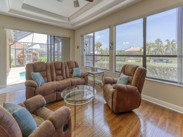 Charming Vacation Home Cape Coral with Caged Pool Sleeps 9