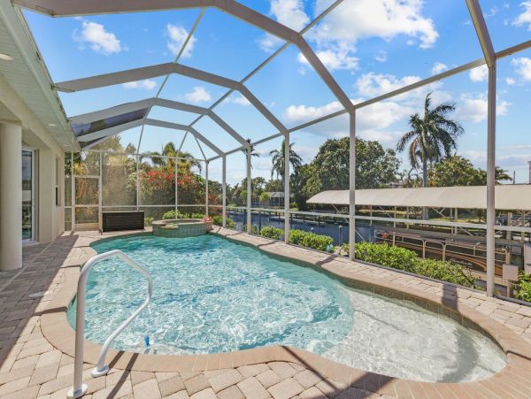 Walk to Beach Four Bedroom Canal Home in Cape Coral