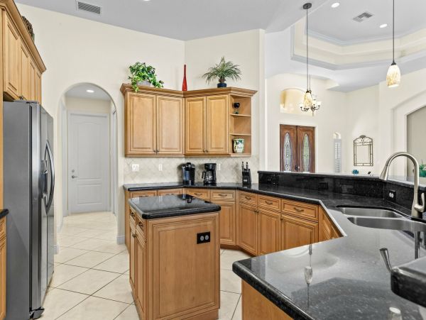 Walk to Beach Four Bedroom Canal Home in Cape Coral