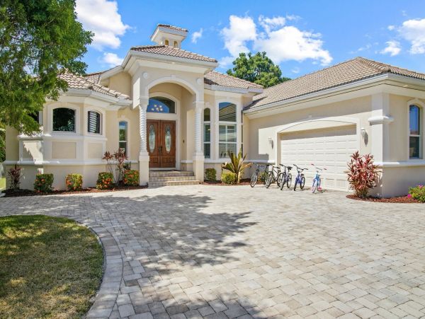 Walk to Beach Four Bedroom Canal Home in Cape Coral