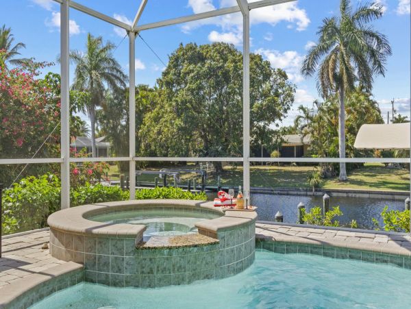 Walk to Beach Four Bedroom Canal Home in Cape Coral