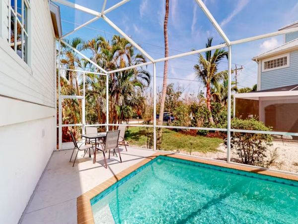 Sanibel Vacation Home Three Bedroom with Pool Canal Views