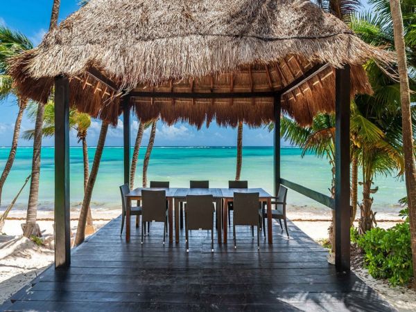 Tropical Oasis: Beachfront Villa in the Heart of Mexico's Caribbean Coast