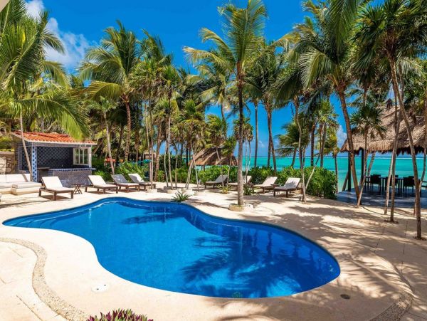 Tropical Oasis: Beachfront Villa in the Heart of Mexico's Caribbean Coast