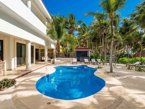 Tropical Oasis: Beachfront Villa in the Heart of Mexico's Caribbean Coast