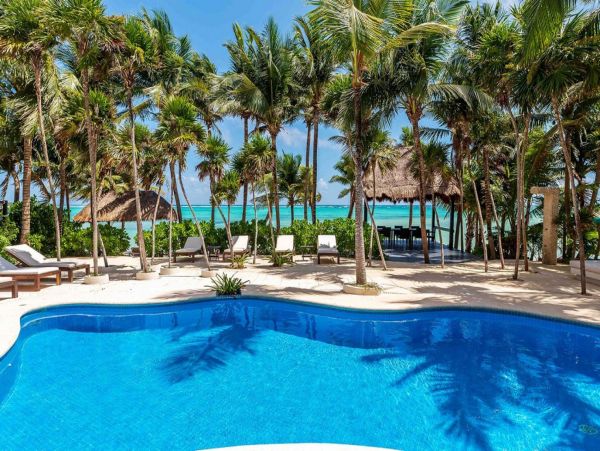Tropical Oasis: Beachfront Villa in the Heart of Mexico's Caribbean Coast