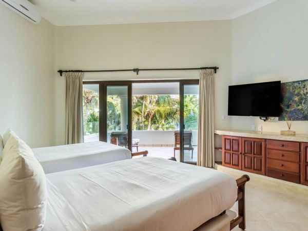Tropical Oasis: Beachfront Villa in the Heart of Mexico's Caribbean Coast