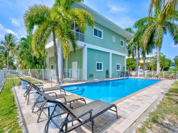 Coco Plum Beach Home in Marathon with Pool and Boat Dock Canal Front