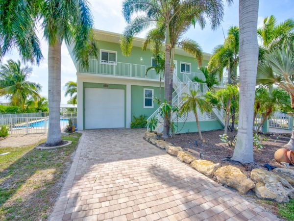 Coco Plum Beach Home in Marathon with Pool and Boat Dock Canal Front