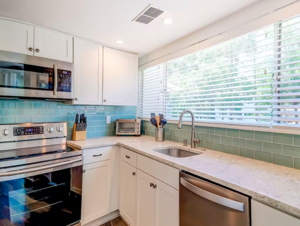 Lagoon View Two Bedroom Condo 2 Pools, Beach Cabana & Walk to Beach