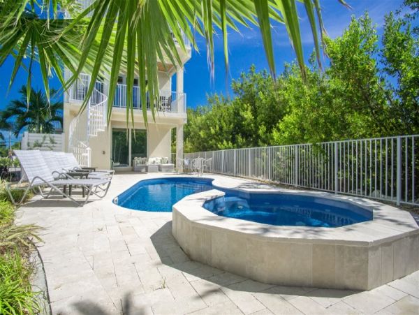 Marathon Vacation Pool Home with Boat Dock Walk To Beach