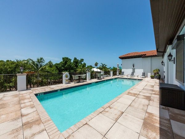 Modern Two Bedroom Vacation Condo in Naples Walk To Beach
