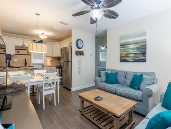 Stroll to our World Class Beach Community Pool Beach Chic Interior.