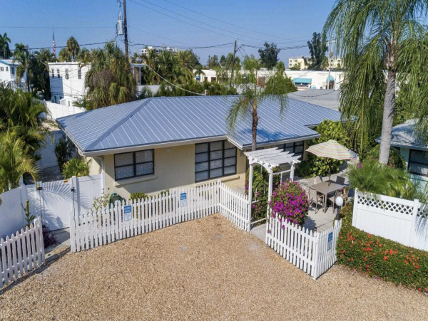 Stroll to our World Class Beach Community Pool Beach Chic Interior.