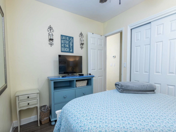 Stroll to our World Class Beach Community Pool Beach Chic Interior.