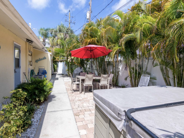 Stroll to our World Class Beach Community Pool Beach Chic Interior.