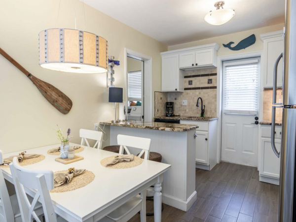 Stroll to our World Class Beach Community Pool Beach Chic Interior.