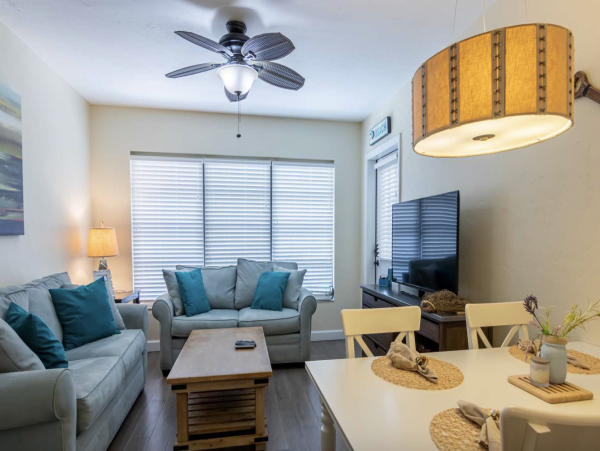 Stroll to our World Class Beach Community Pool Beach Chic Interior.