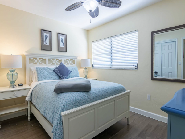 Stroll to our World Class Beach Community Pool Beach Chic Interior.