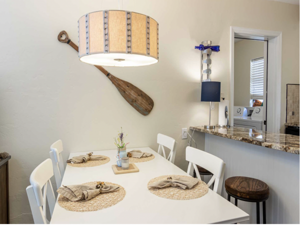 Stroll to our World Class Beach Community Pool Beach Chic Interior.