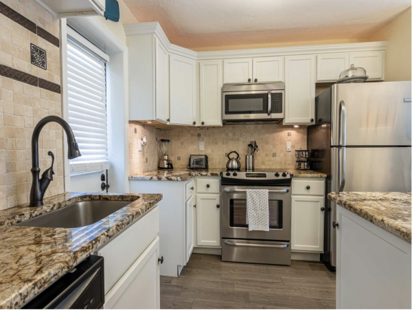 Stroll to our World Class Beach Community Pool Beach Chic Interior.