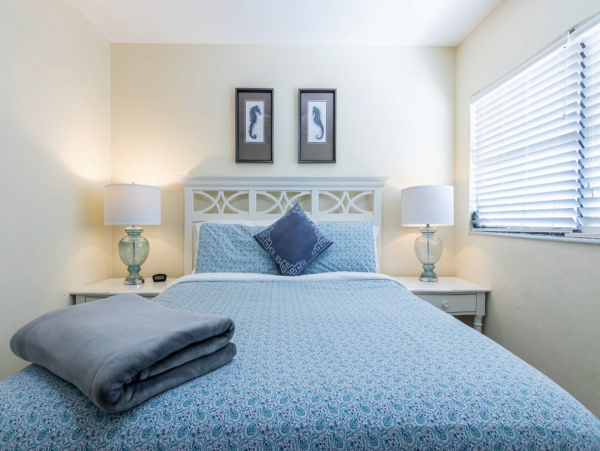 Stroll to our World Class Beach Community Pool Beach Chic Interior.